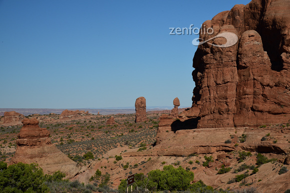 Balance Rock in the distance;  Arches Nat Pk